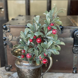 Small faux greenery pick with red berries