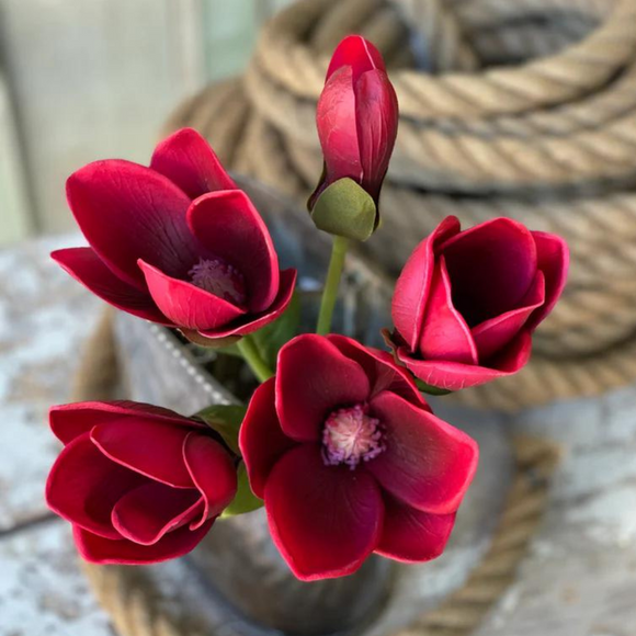 Bundle of merlot colored faux magnolias