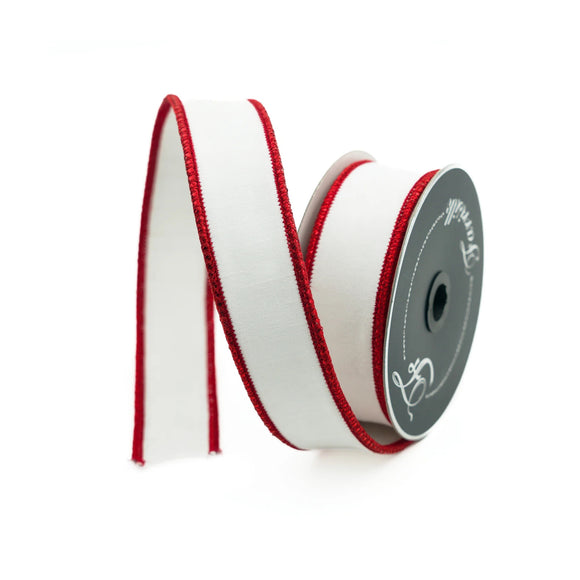 Roll of white ribbon with red trim