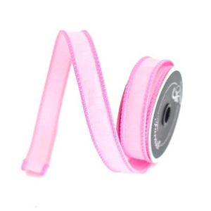 Roll of pink ribbon