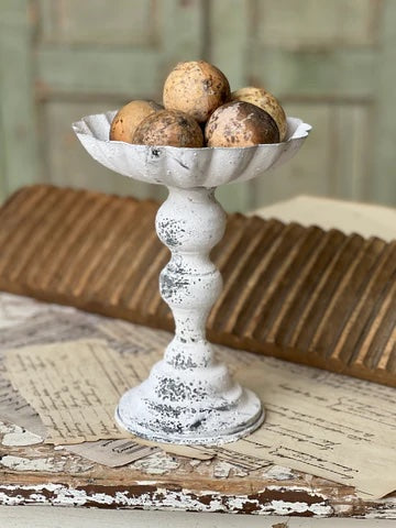 Decorative scalloped pedestal candle holder with decorative wooden balls inside