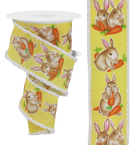 Roll of ribbon with bunnies on yellow background with white fluffy edges