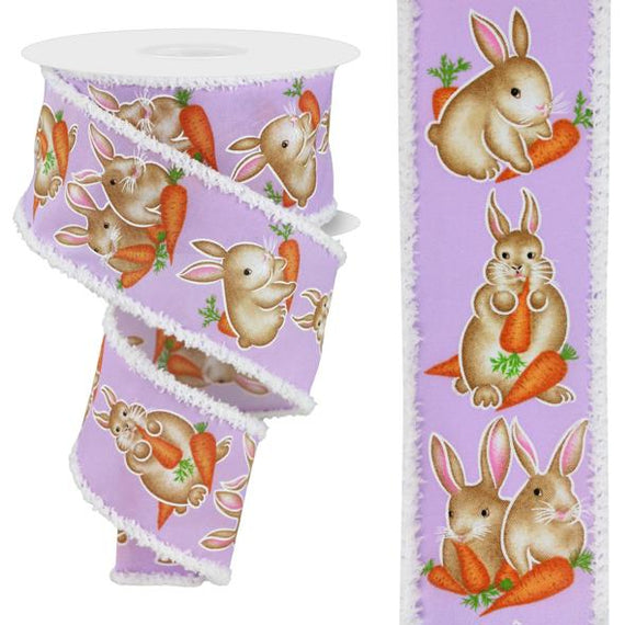 Roll of ribbon with bunnies on lavender background with white fluffy edges