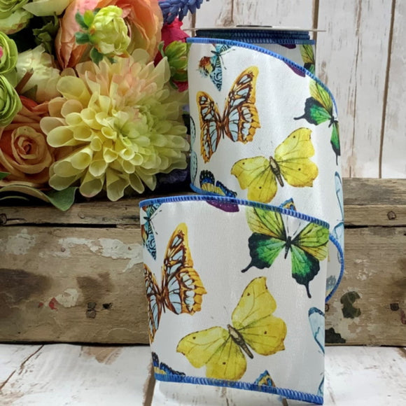 Roll of ribbon with butterflies