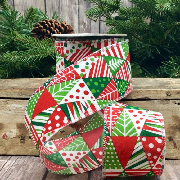 Roll of ribbon with triangle christmas trees