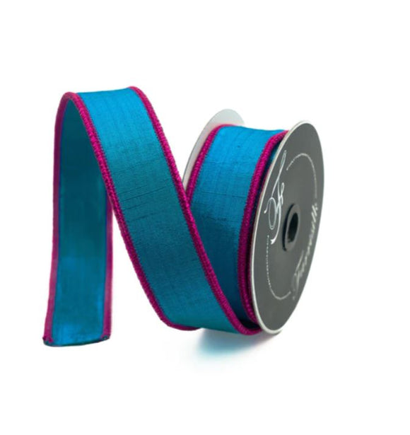 Roll of hot pink and turquoise ribbon
