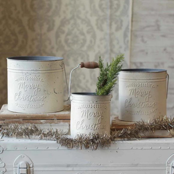 set of three cream colored buckets that say merry Christmas