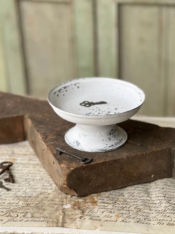 Cream colord pedestal bowl