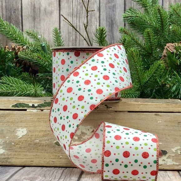 Roll of ribbon with red and lime green dots