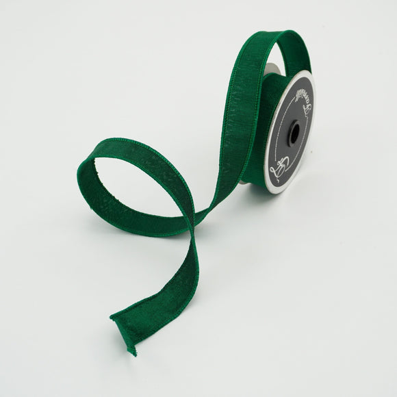 Roll of silk ribbon in Emerald color