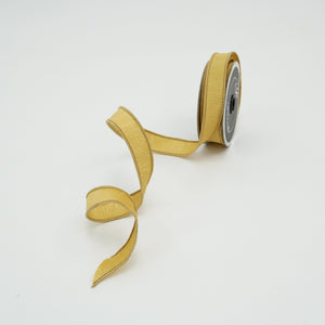 Roll of gold ribbon