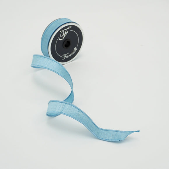 Roll of silk ribbon in Light Blue color