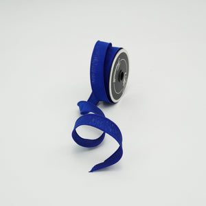 Roll of silk ribbon in Royal Blue color