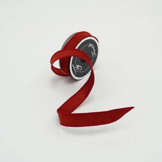 Roll of silk ribbon in Ruby color