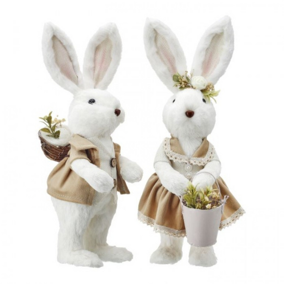 Set of bunnies girl and boy in easter outfits